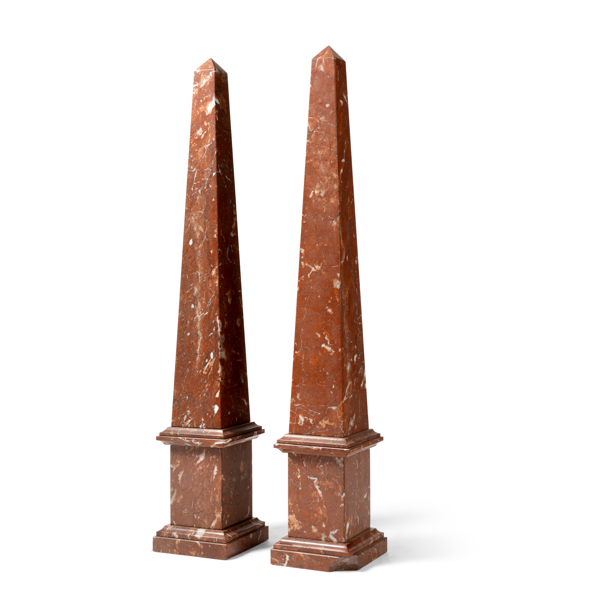 A PAIR OF MARMO ROSSO MARBLE OBELISKS
