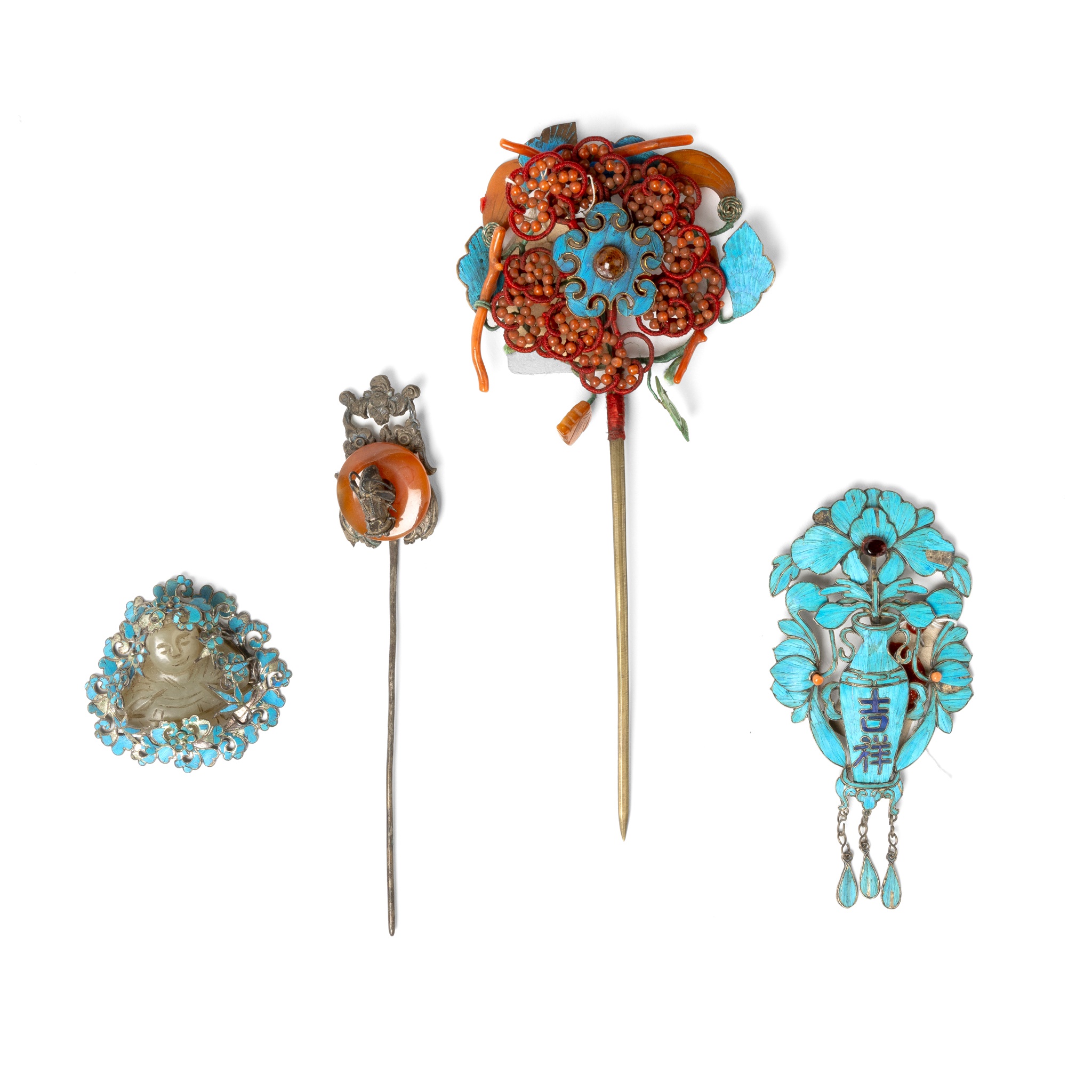 GROUP OF FOUR HAIR ORNAMENTS
