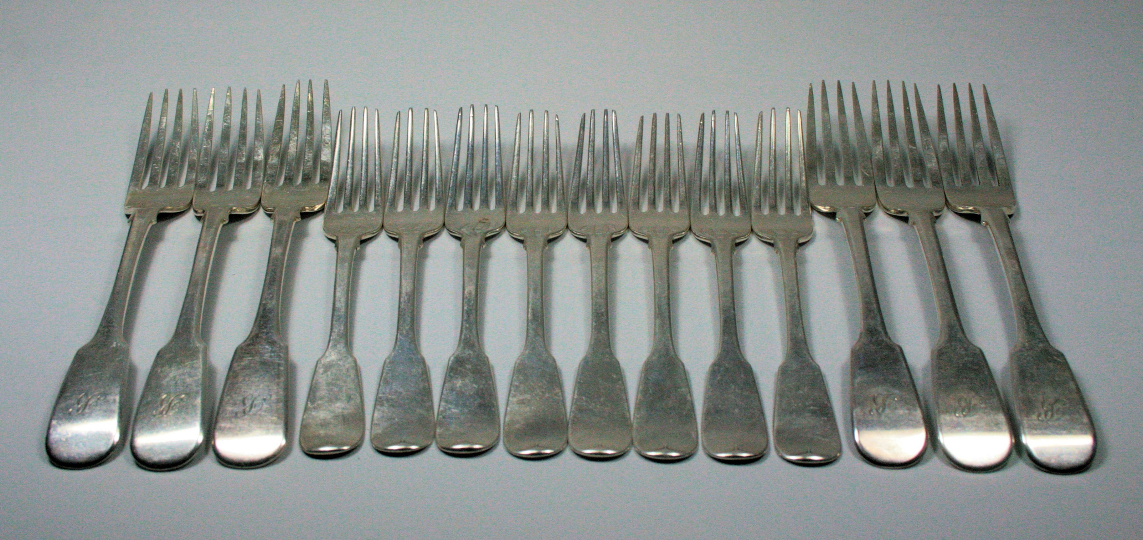 A set of six William IV table forks