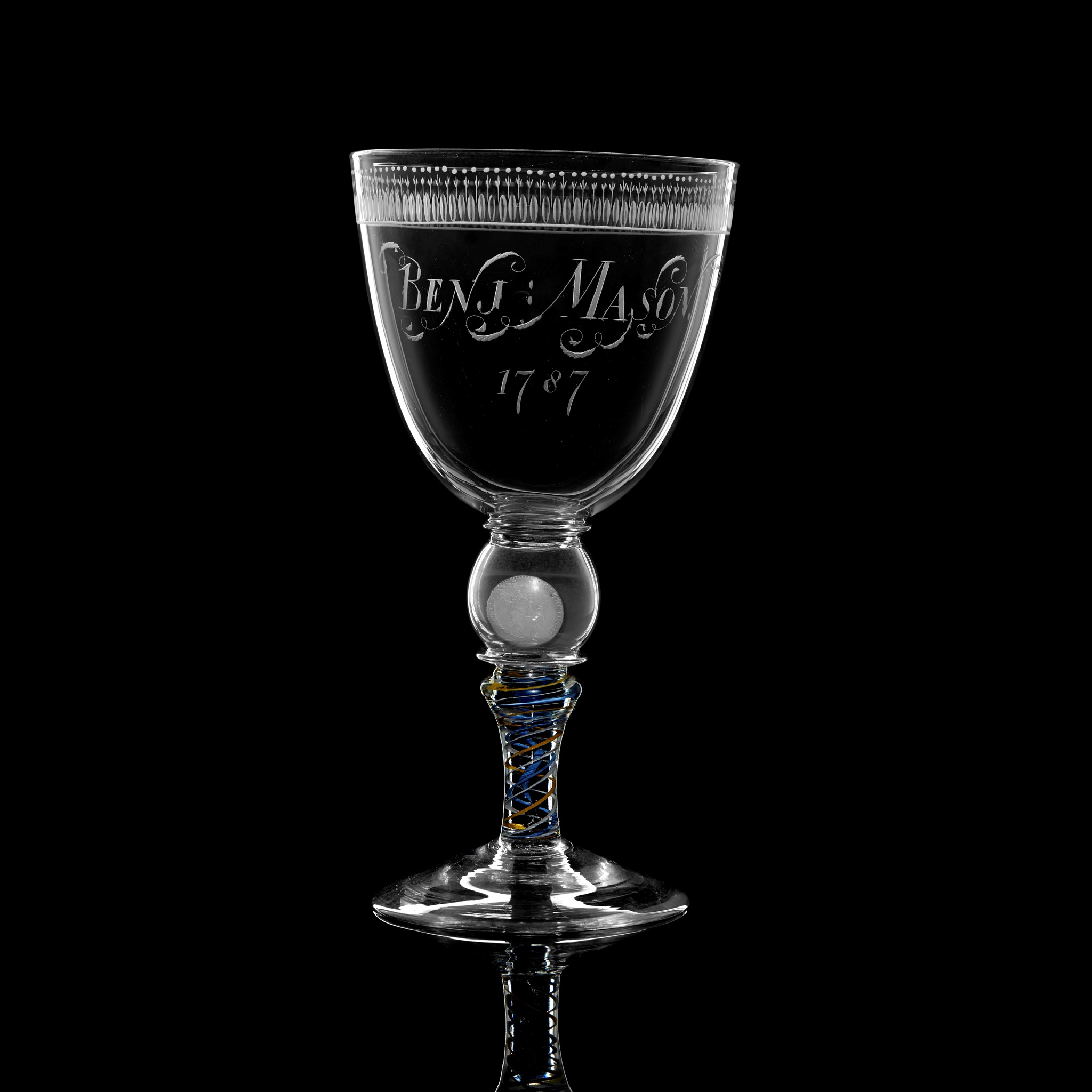 LARGE GEORGIAN ENGRAVED AND COLOURED TWIST STEM GLASS COIN GOBLET