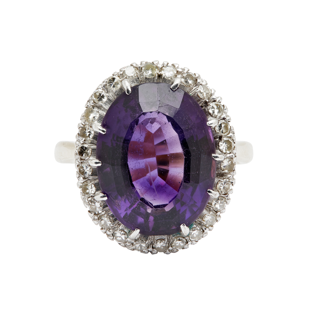 An amethyst and diamond set cocktail ring