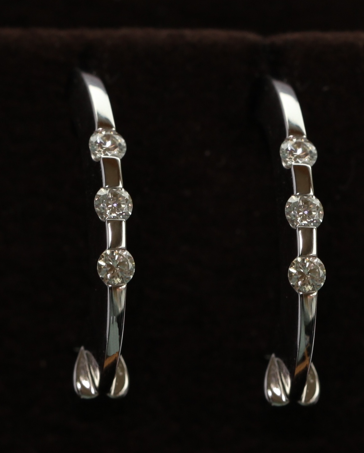 ROBERTO COIN - a pair of 18ct white gold mounted diamond set earrings