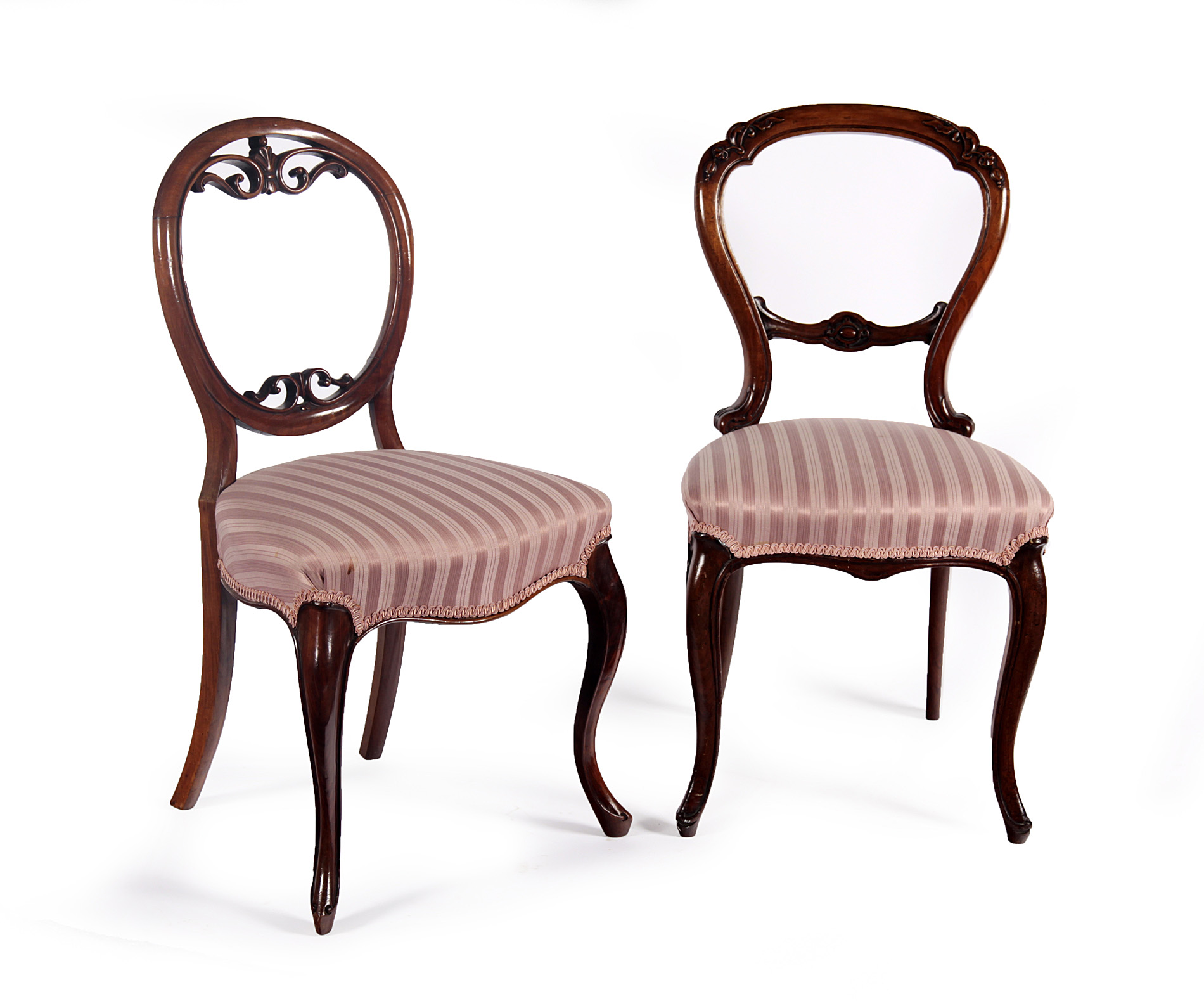 A MATCHED SET OF SIX VICTORIAN MAHOGANY BALLOON BACK CHAIRS