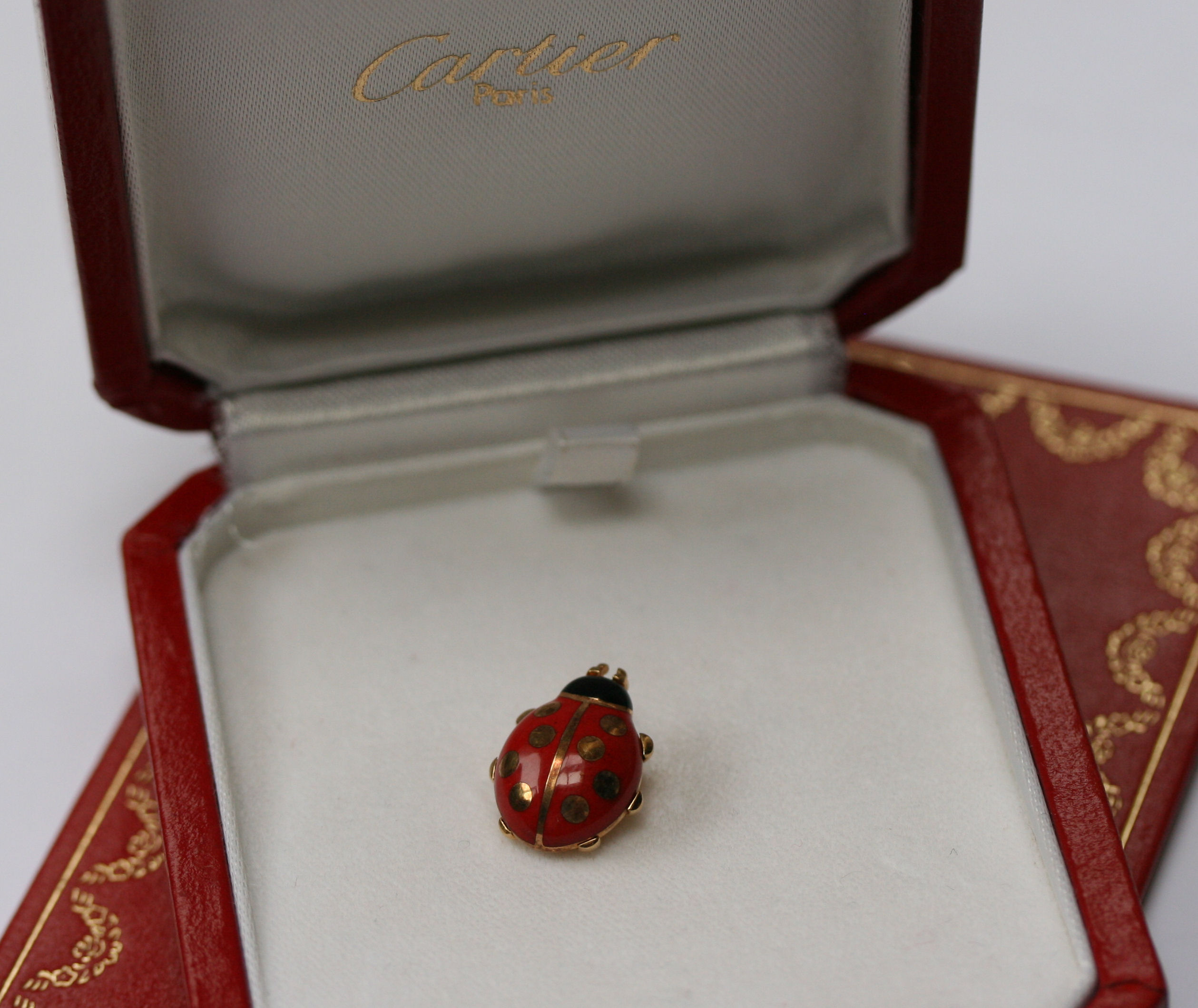 Cartier - an enamelled ladybird brooch