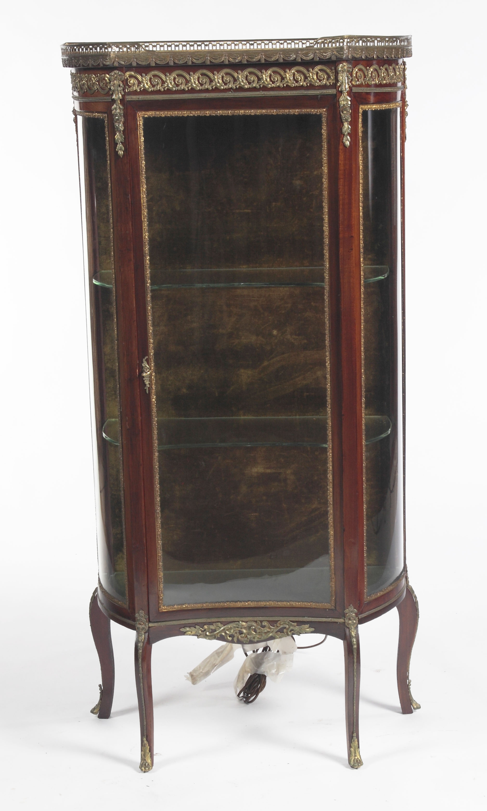 An Edwardian mahogany concaved vitrine In the late 18th century style