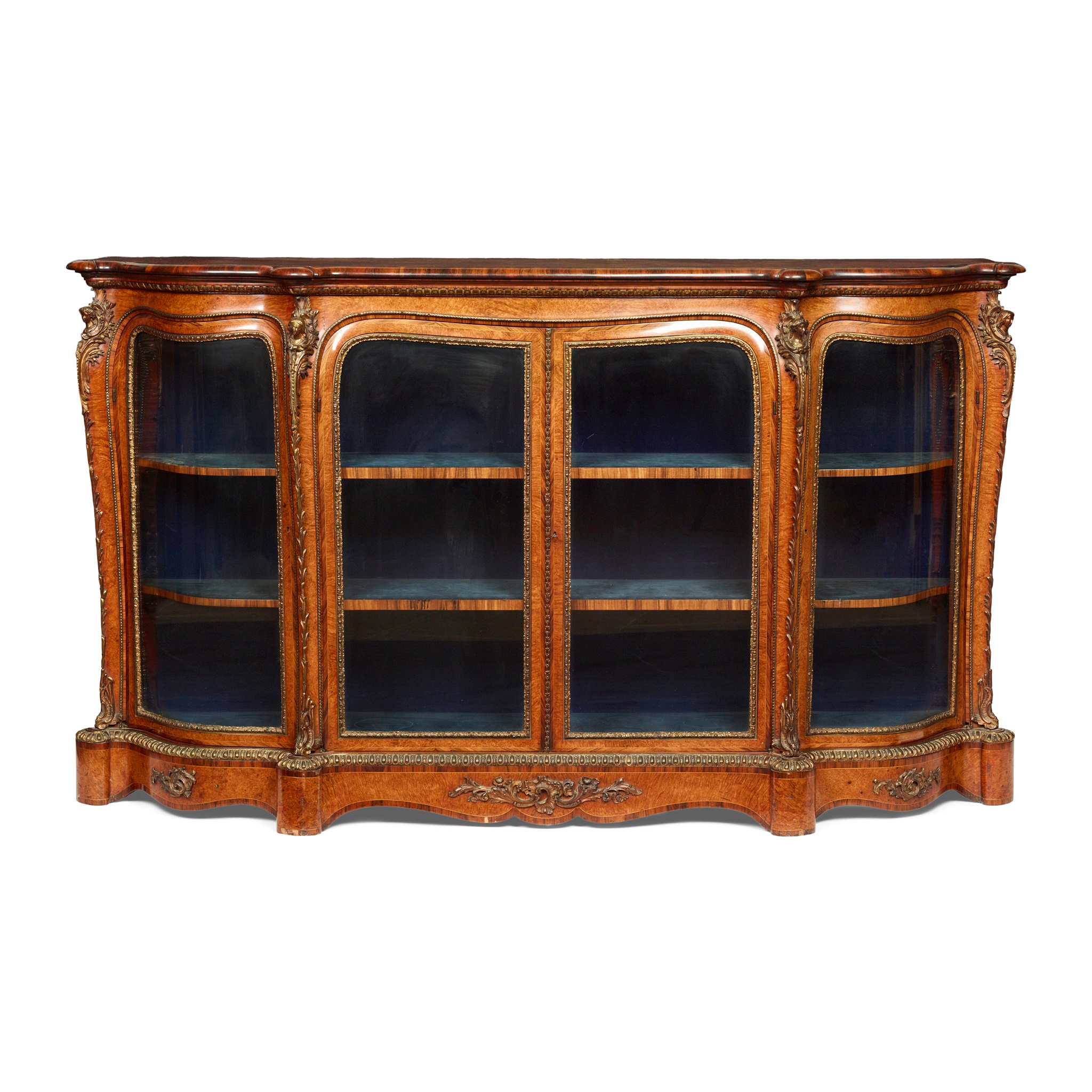 EARLY VICTORIAN KINGWOOD, WALNUT, AND THUYAWOOD SERPENTINE DISPLAY CABINET