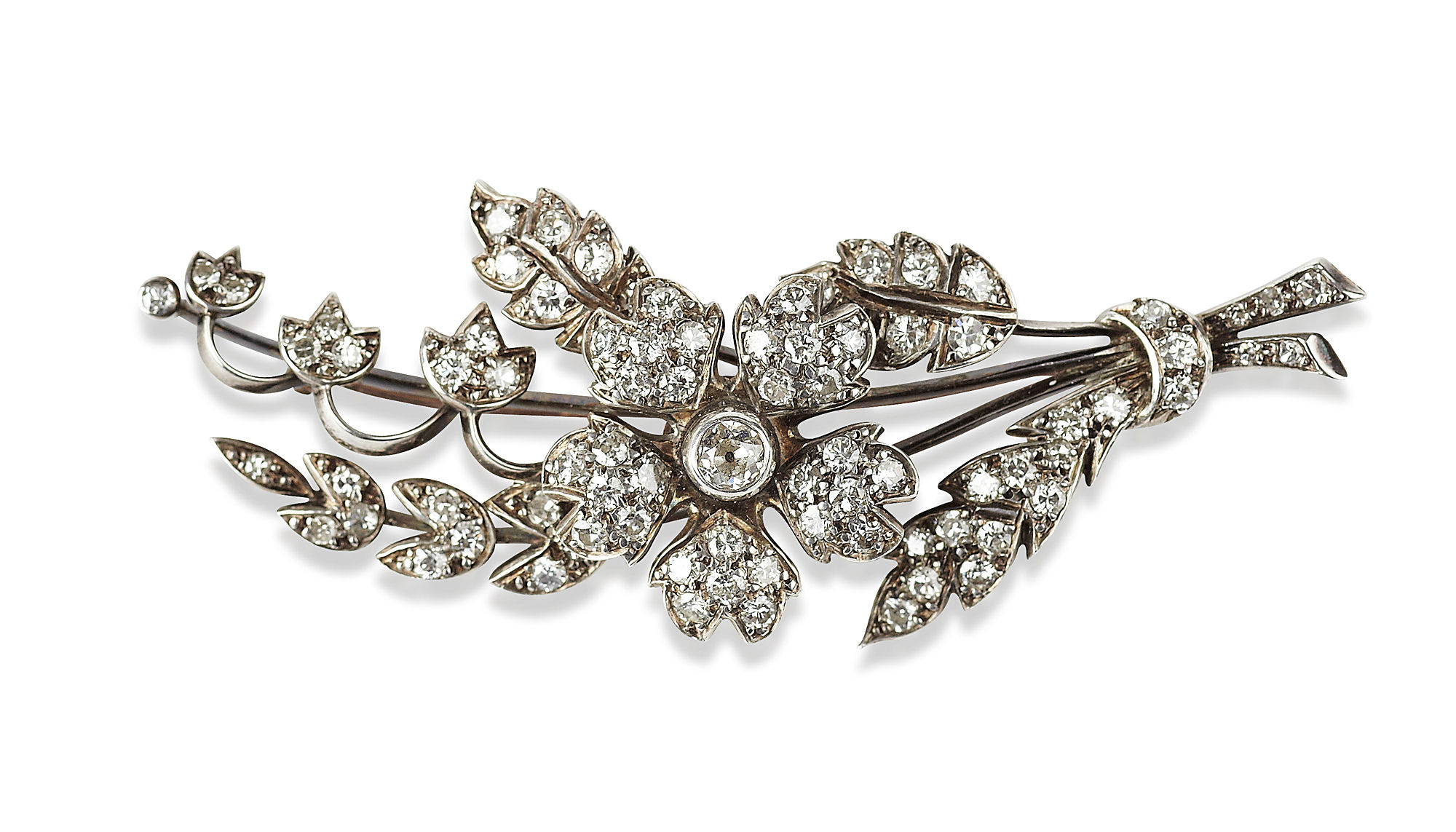 An early 20th century diamond set foliate spray brooch
