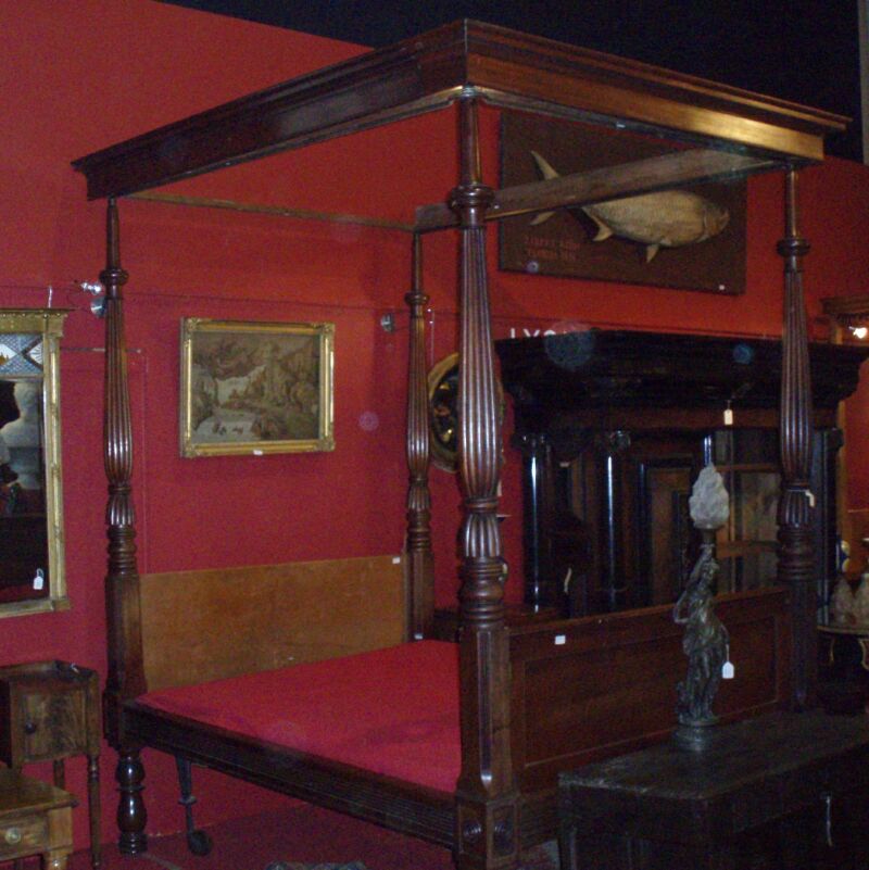 A mid Victorian period mahogany four poster bed