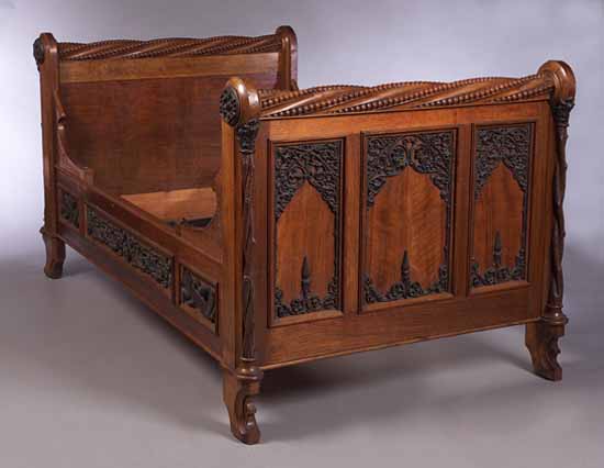 A French Gothic Revival walnut single bed