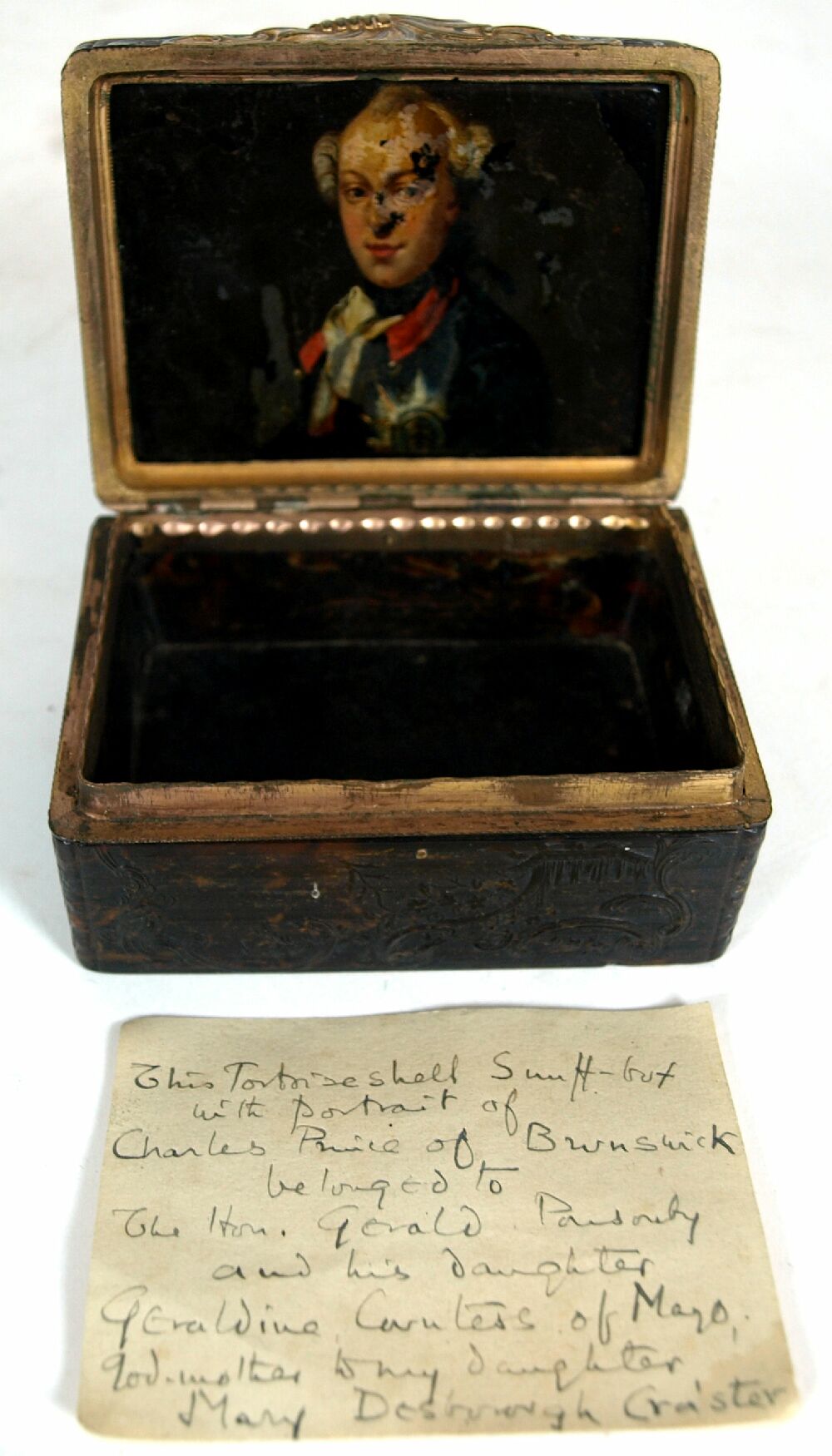 A mid 18th century tortoiseshell and gilt metal snuff box