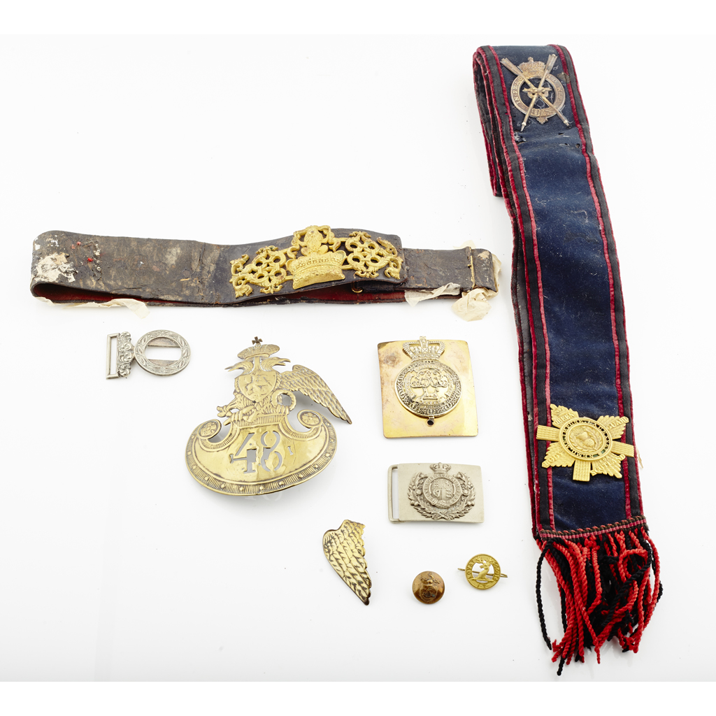 QUEEN'S ROYAL BODYGUARD - A shoulder belt with gilt and enamelled badge and a silver oval badge