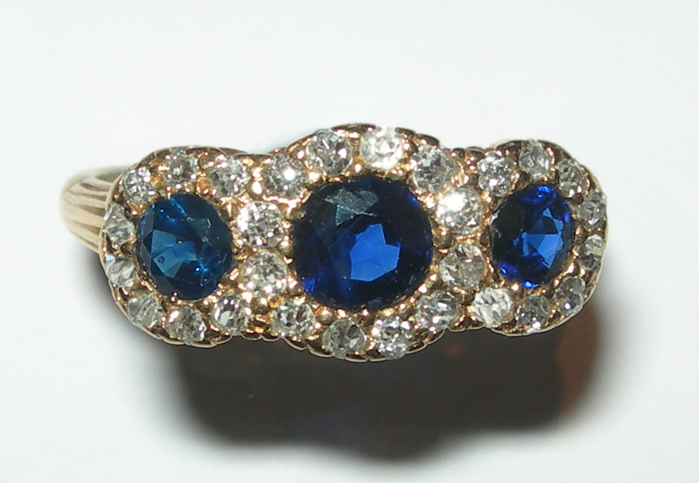 A late Victorian sapphire and diamond set cluster ring,
