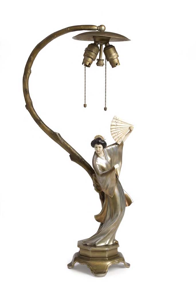 A Hans Harders patinated bronze and ivory figural lamp,