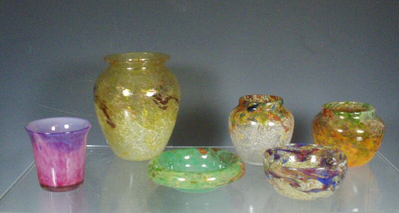 A collection of Monart glass