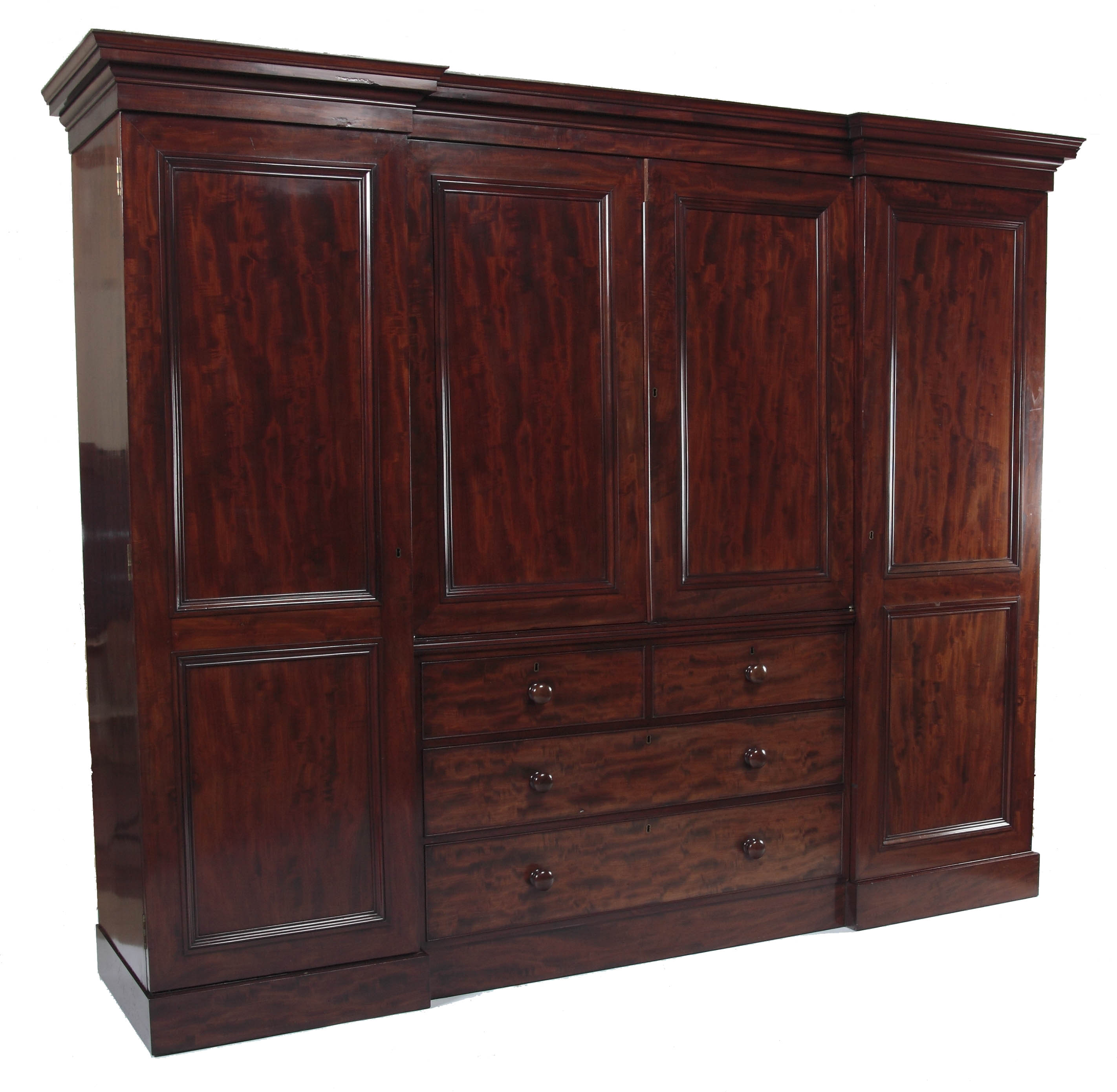 A 19th century mahogany inverted breakfront compactum