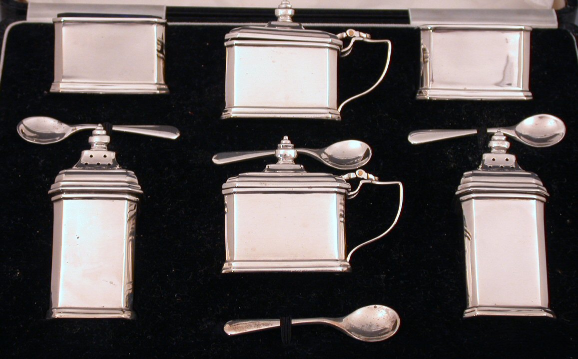 A cased ten piece condiment set