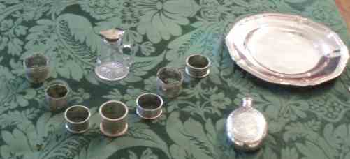 A group of silver items