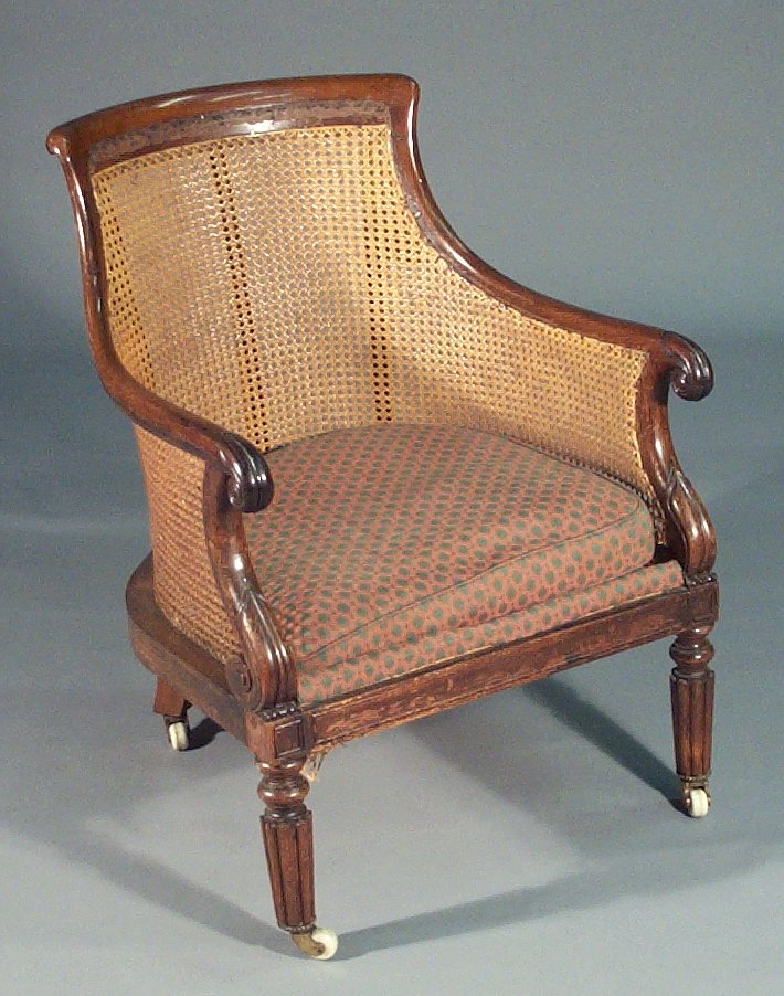 A Regency rosewood framed bergere armchair