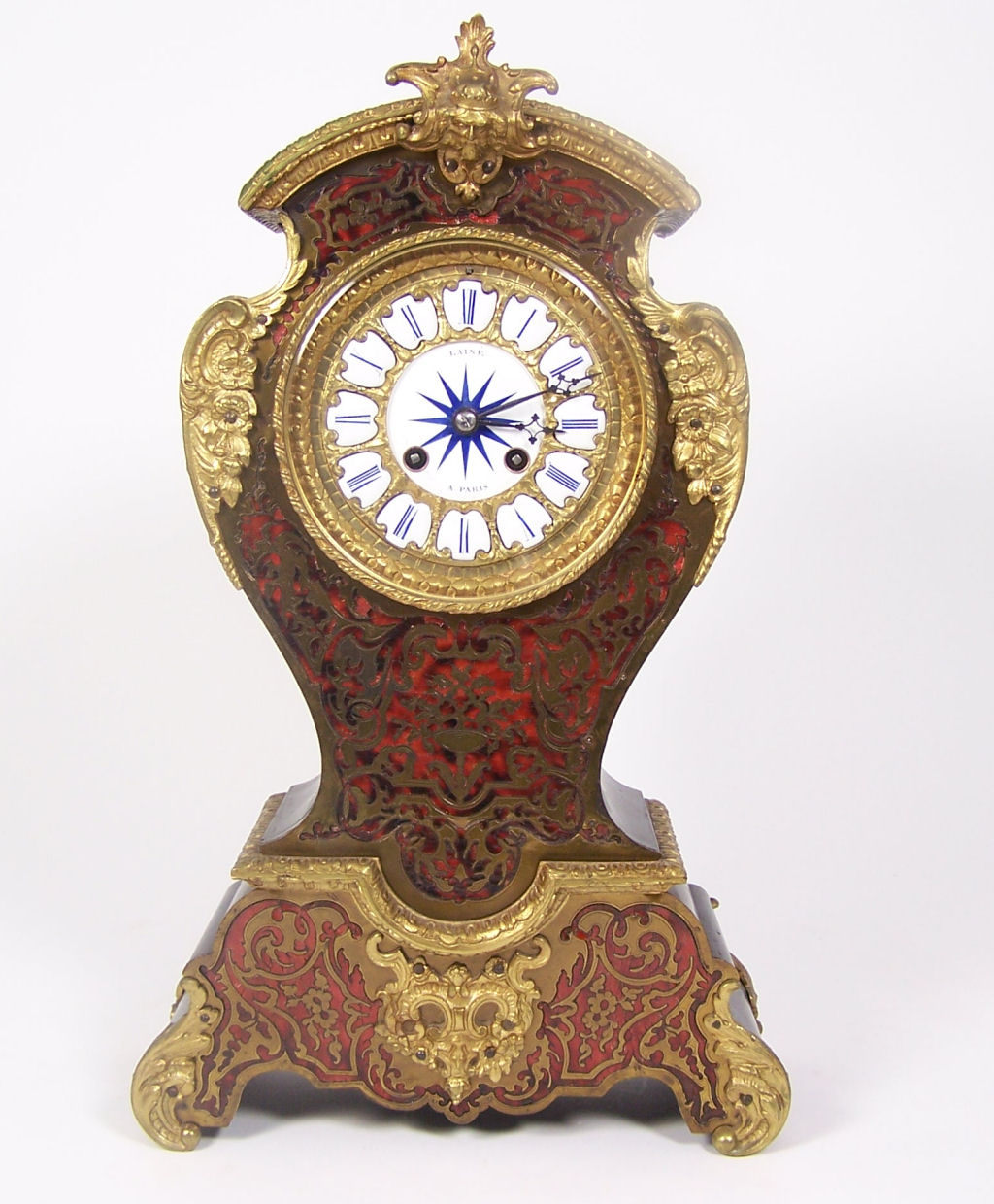 A 19th century French Boulle and ebonised mantel clock