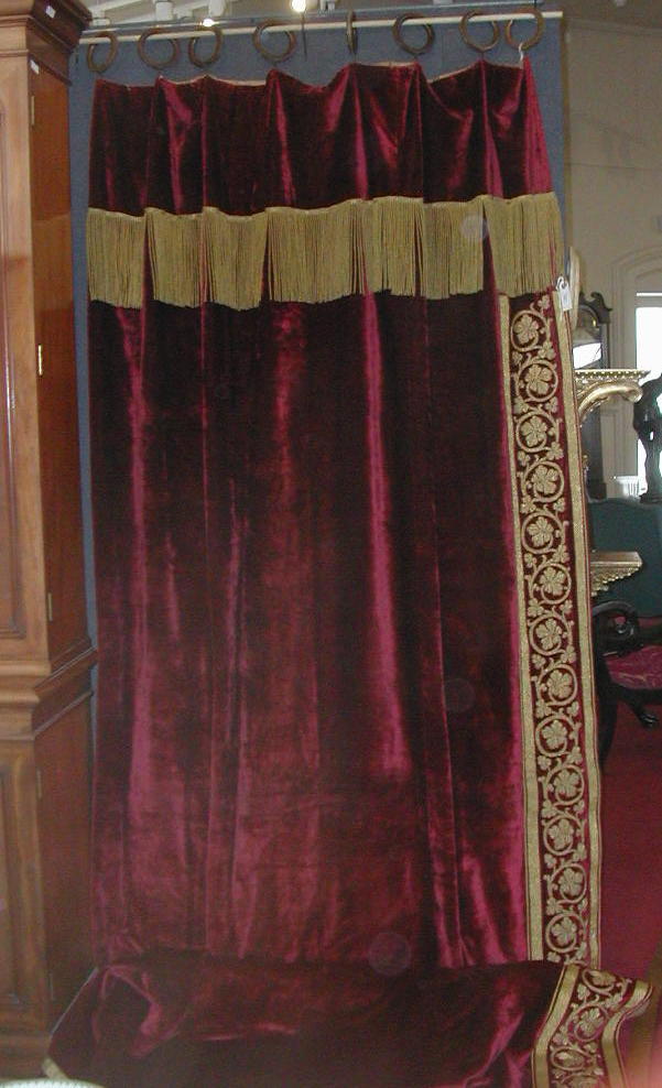 A pair of crimson velvet curtains