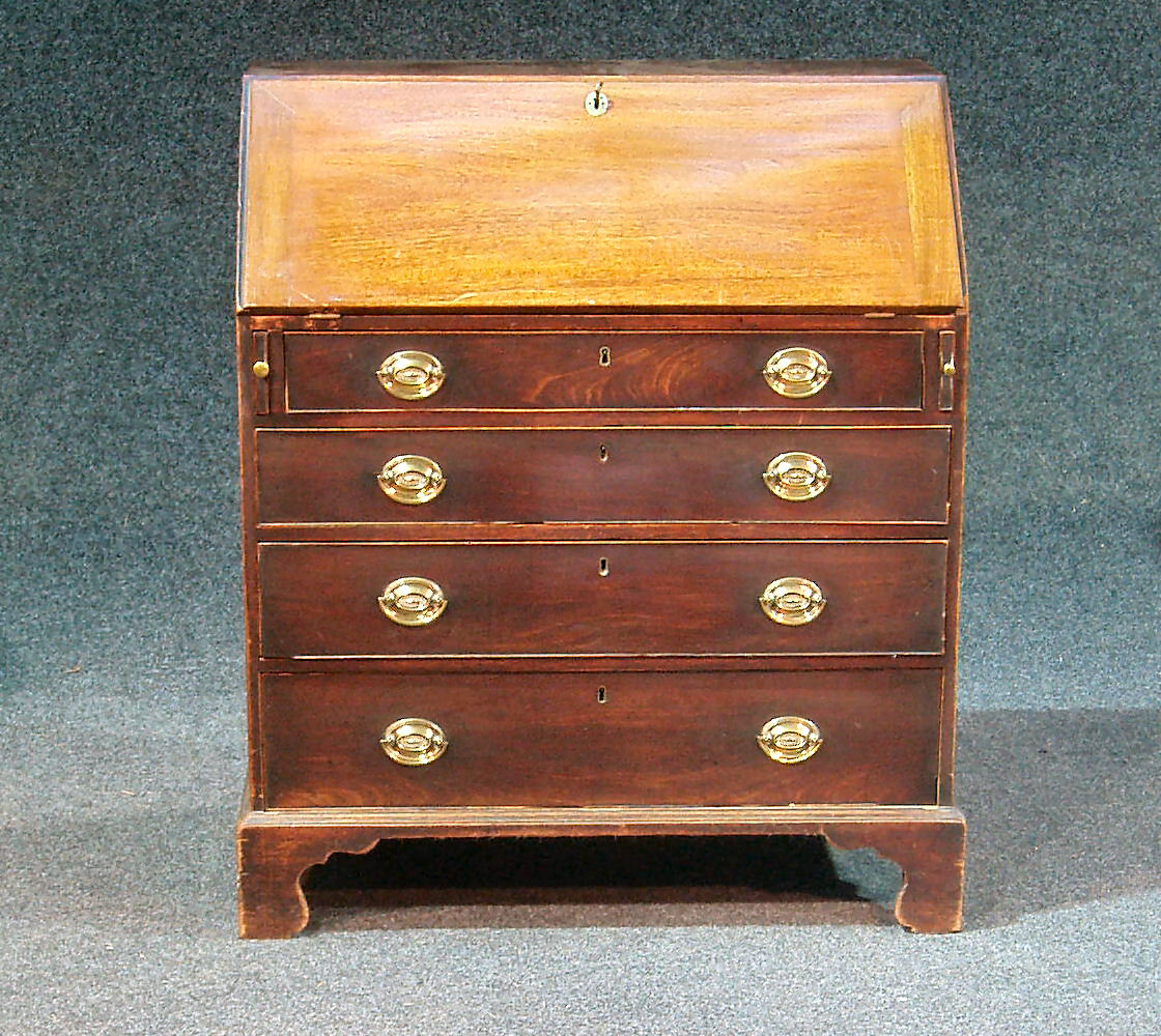A George III mahogany bureau,