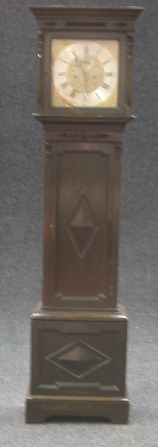 An oak longcase clock,