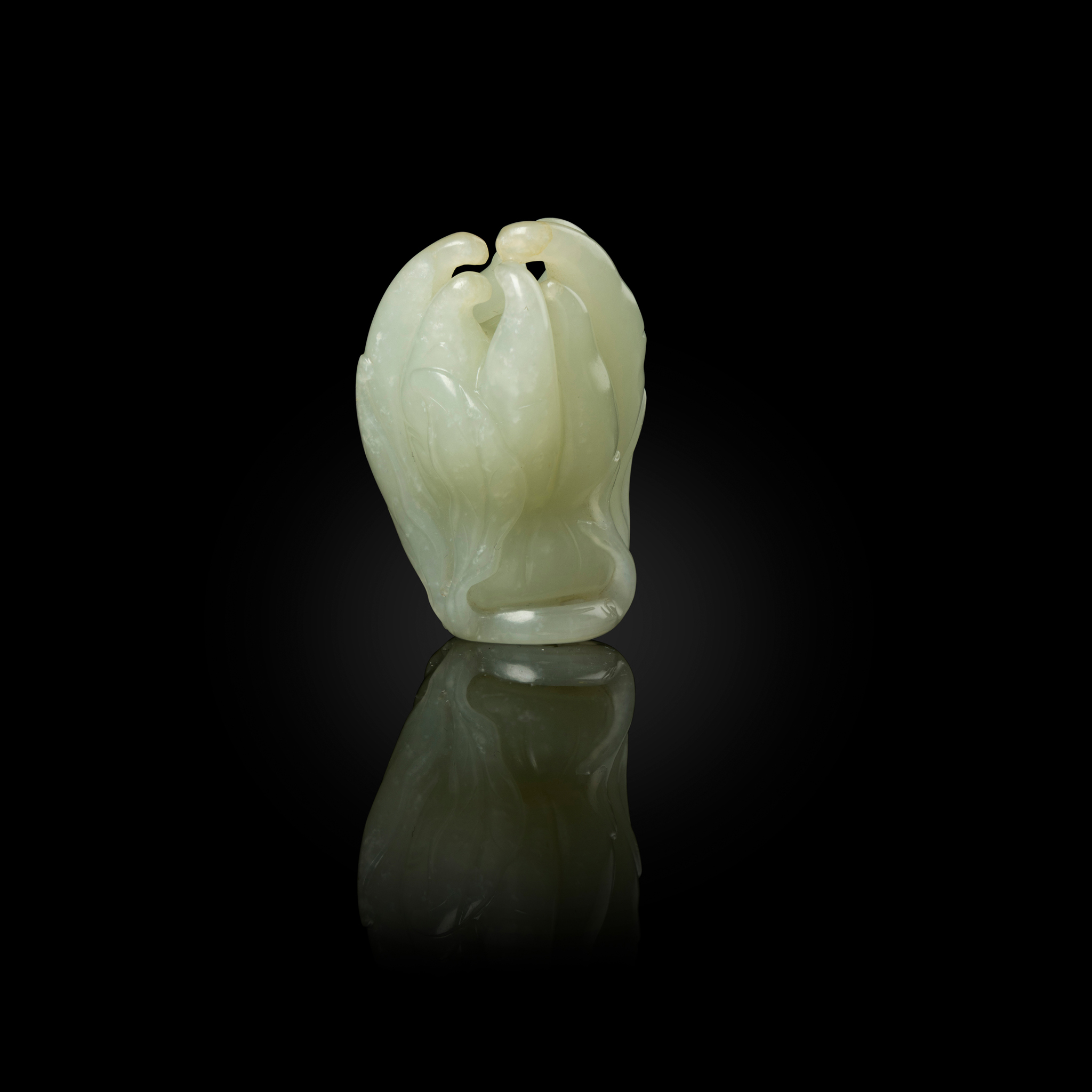 CHINESE WHITE JADE WITH RUSSET INCLUSIONS CARVING OF A FINGER CITRUS