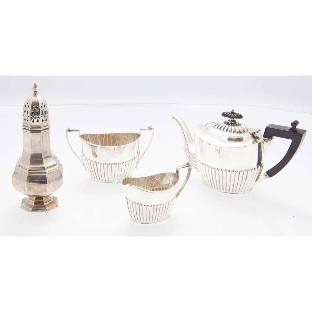 A small three piece tea service