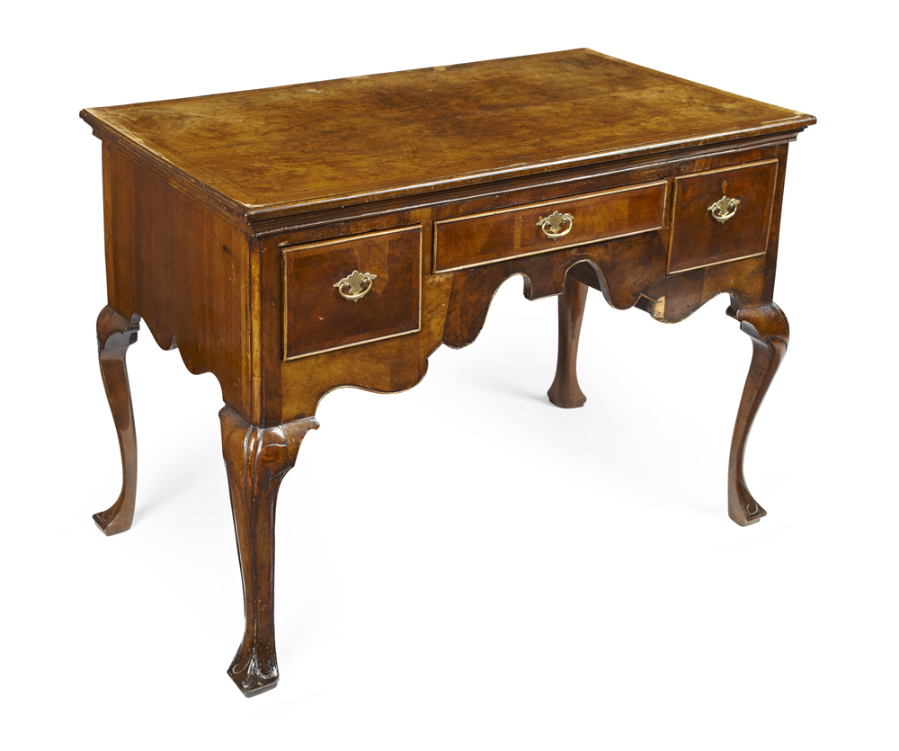 A George II style walnut lowboy
