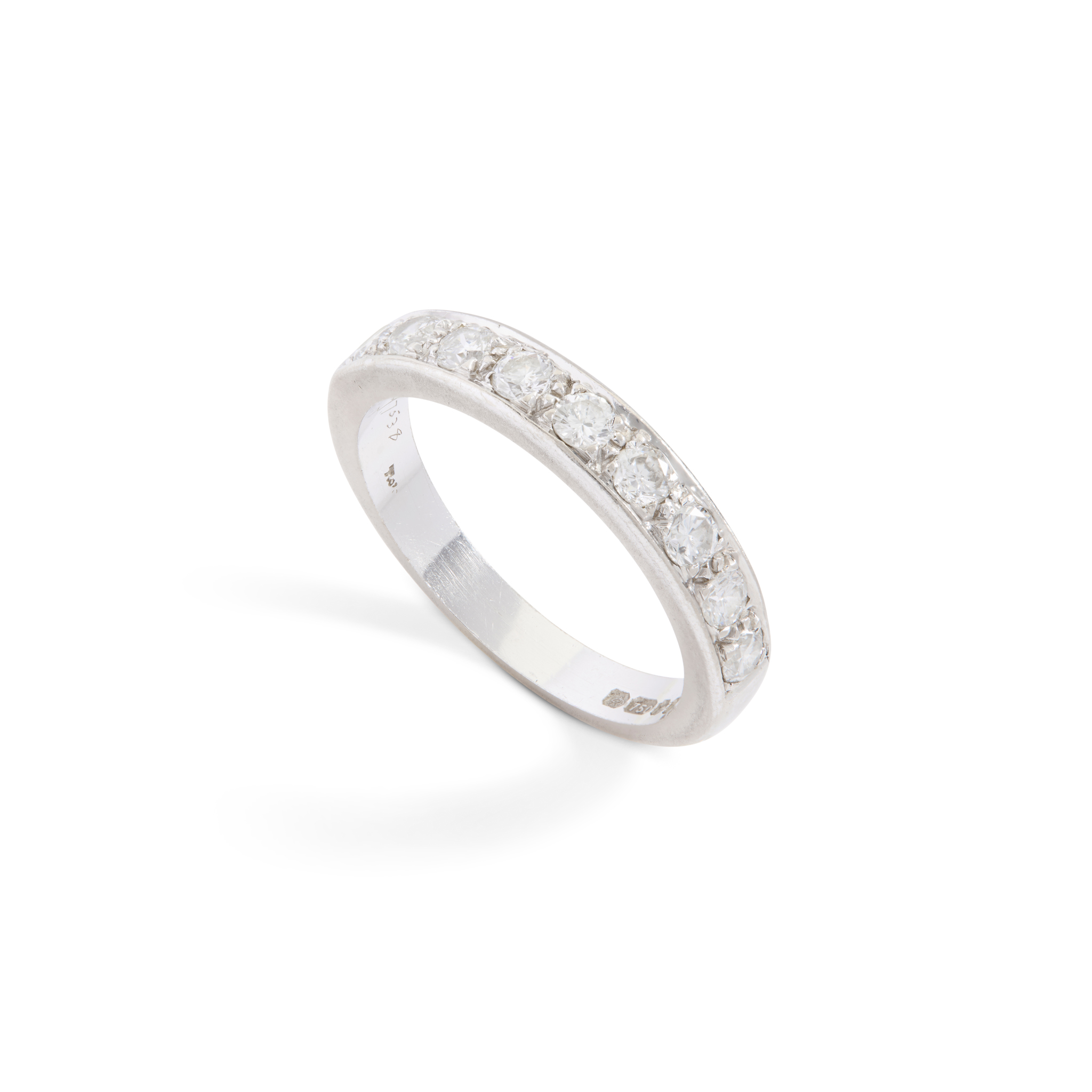 An 18ct gold diamond half-eternity ring