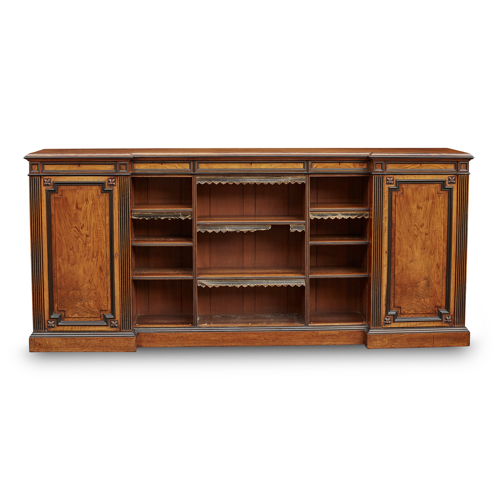 WILLIAM IV WALNUT AND EBONISED LOW BREAKFRONT BOOKCASE