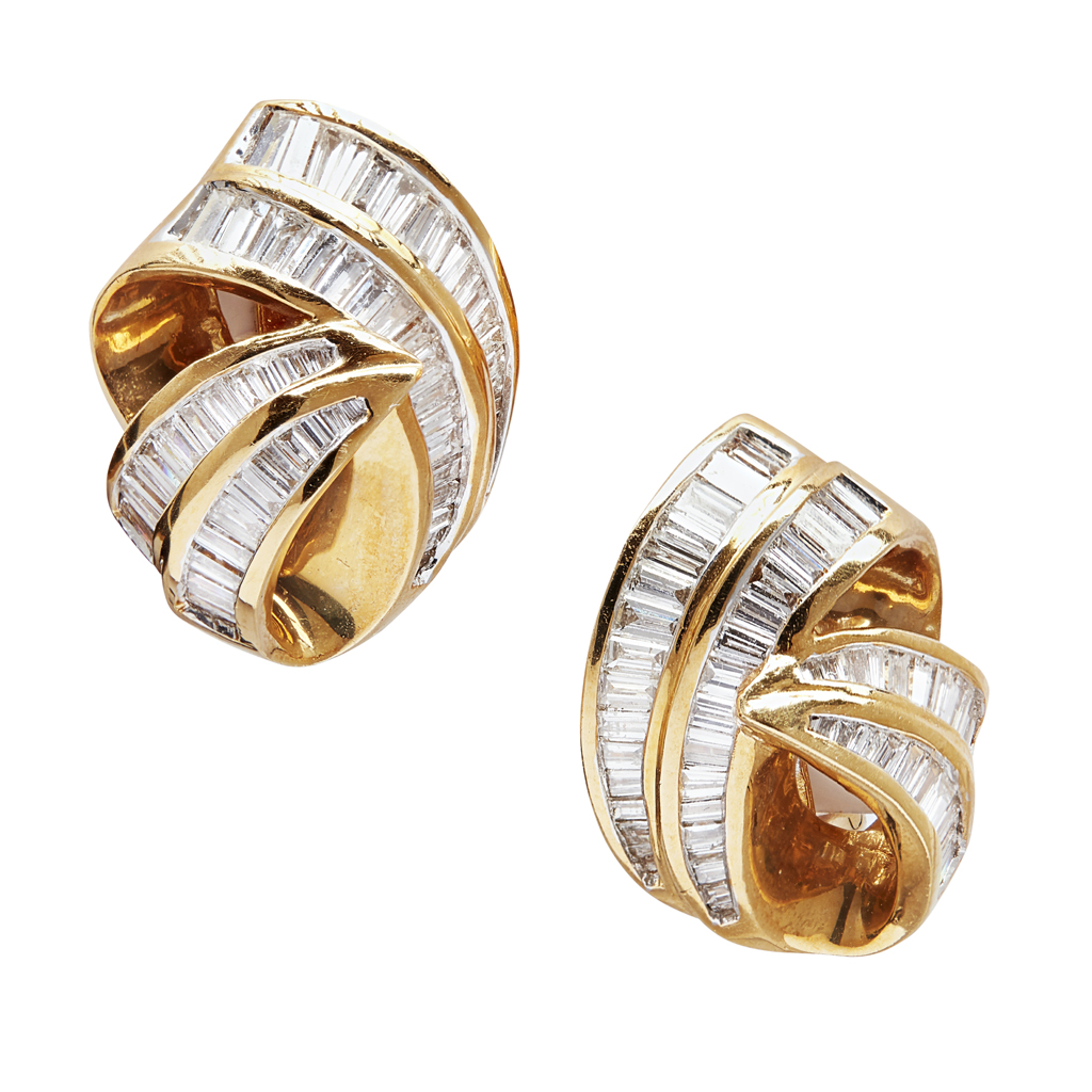A pair of diamond set earrings