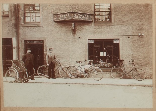 Trams, automobiles, delivery lorries, motorbikes and airship