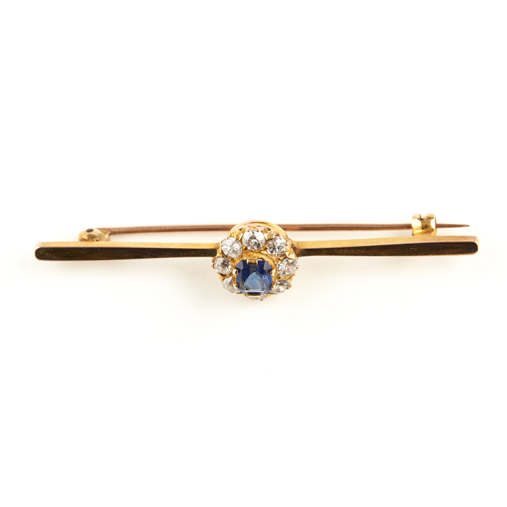 A sapphire and diamond set bar brooch
