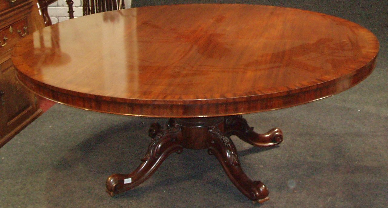 A large Victorian mahogany breakfast table,
