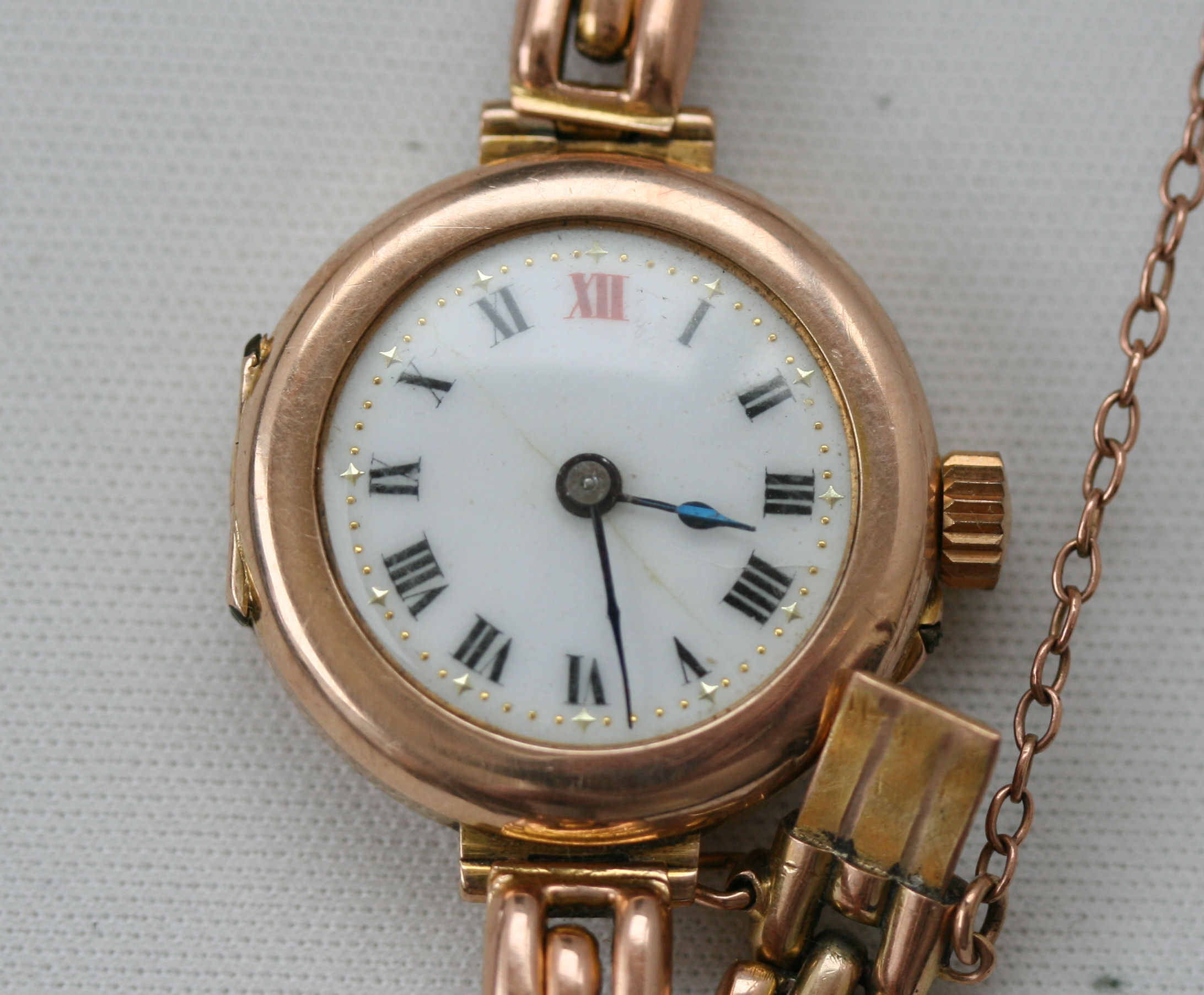 A group of four early 20th century gold ladies wrist watches