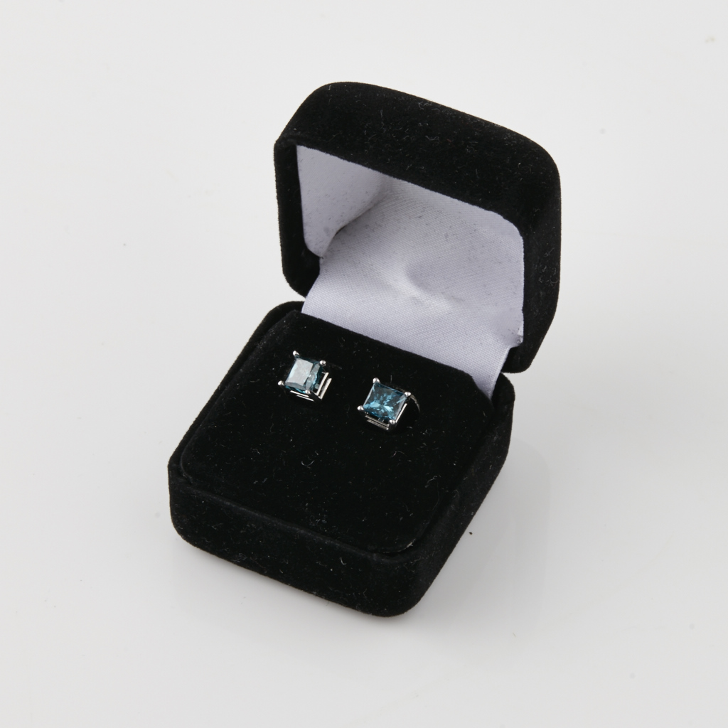 A pair of blue diamond ear studs