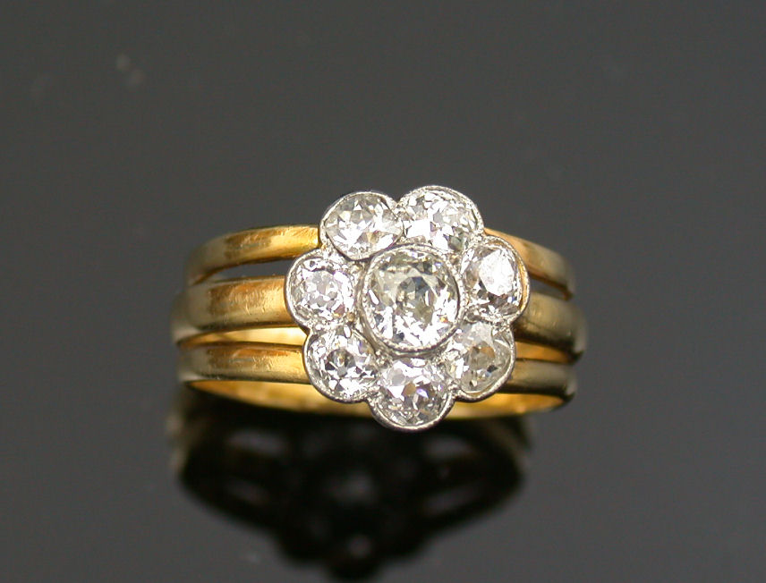 A diamond floral cluster ring,