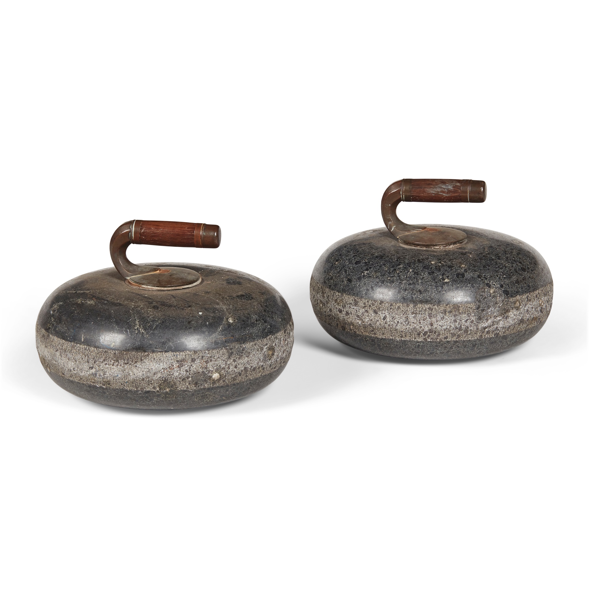 A PAIR OF AILSA CRAIG GRANITE CURLING STONES