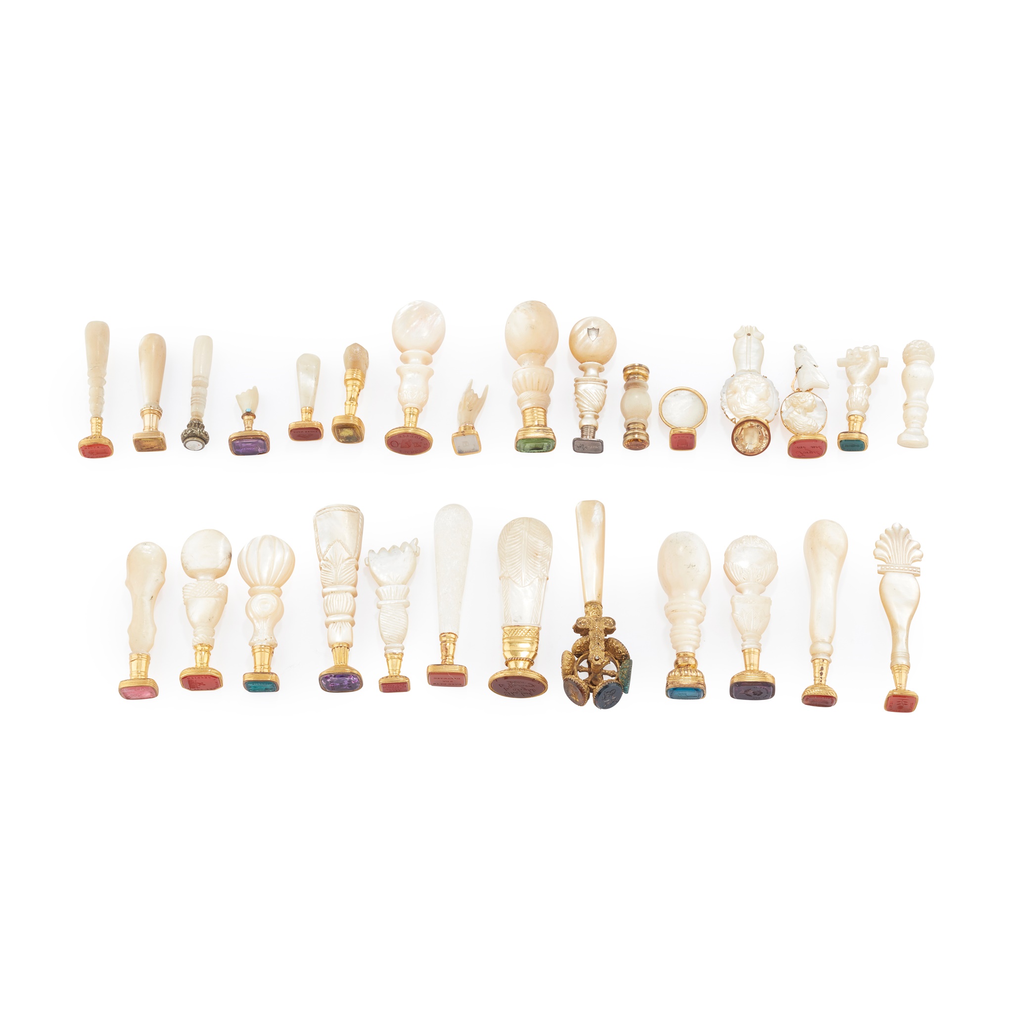 A COLLECTION OF MOTHER OF PEARL HANDLED TABLE SEALS