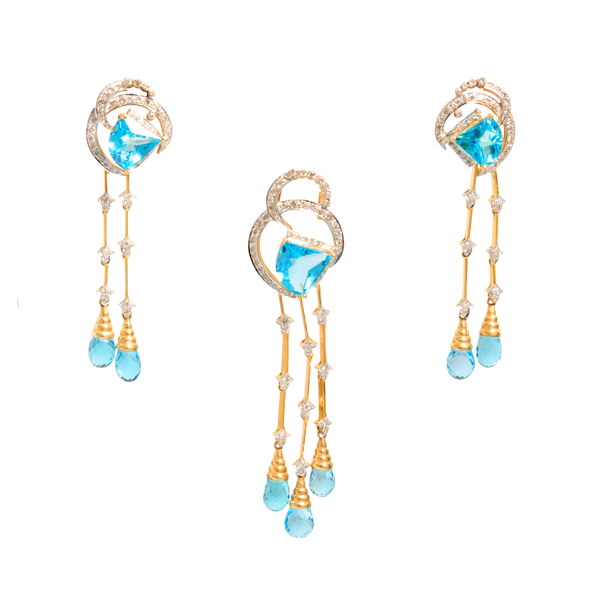 A blue topaz and diamond pendant with matching earrings