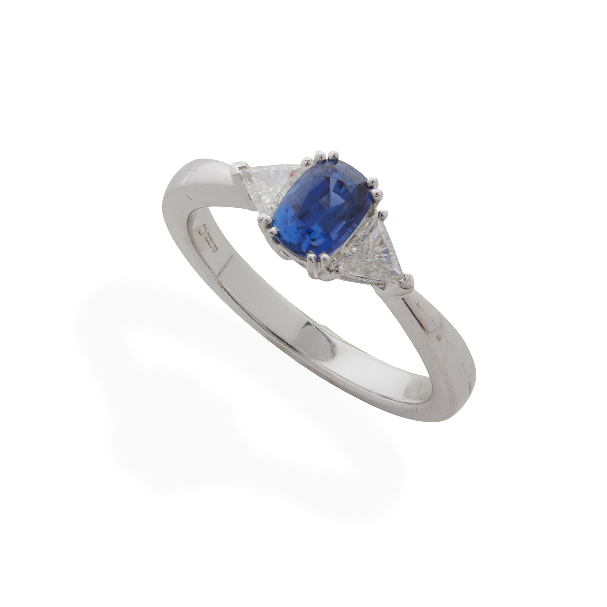 An 18ct gold sapphire and diamond three-stone ring