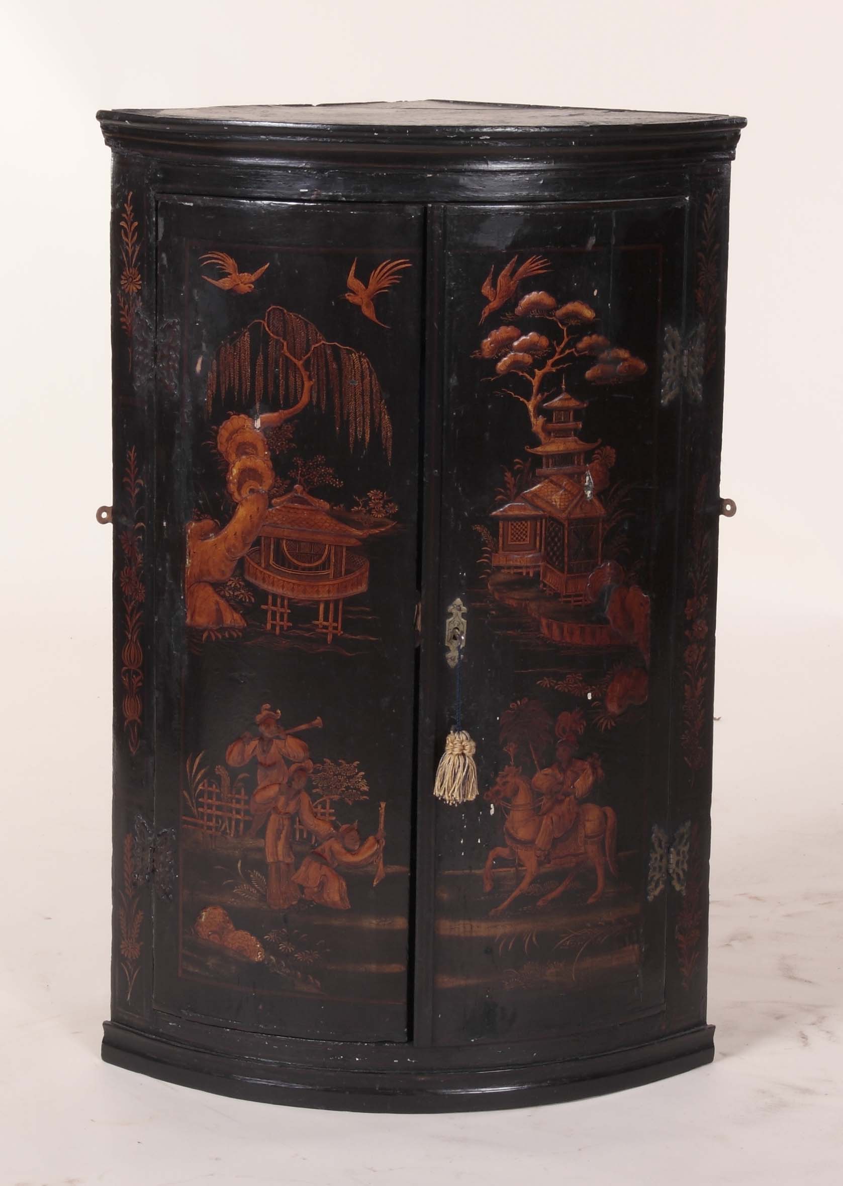 An 18th century lacquer corner cabinet