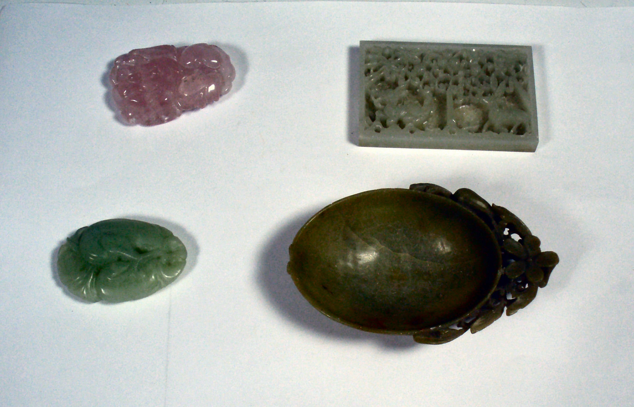 A collection of carved hardstone items
