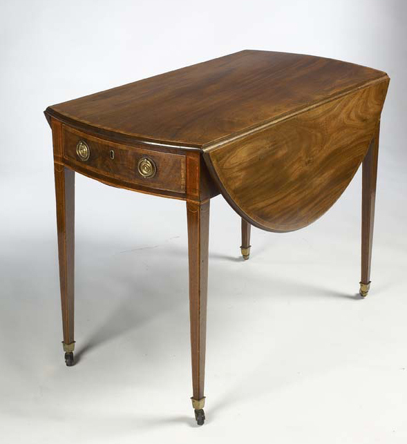 A late George III period mahogany and tulipwood crossbanded Pembroke table