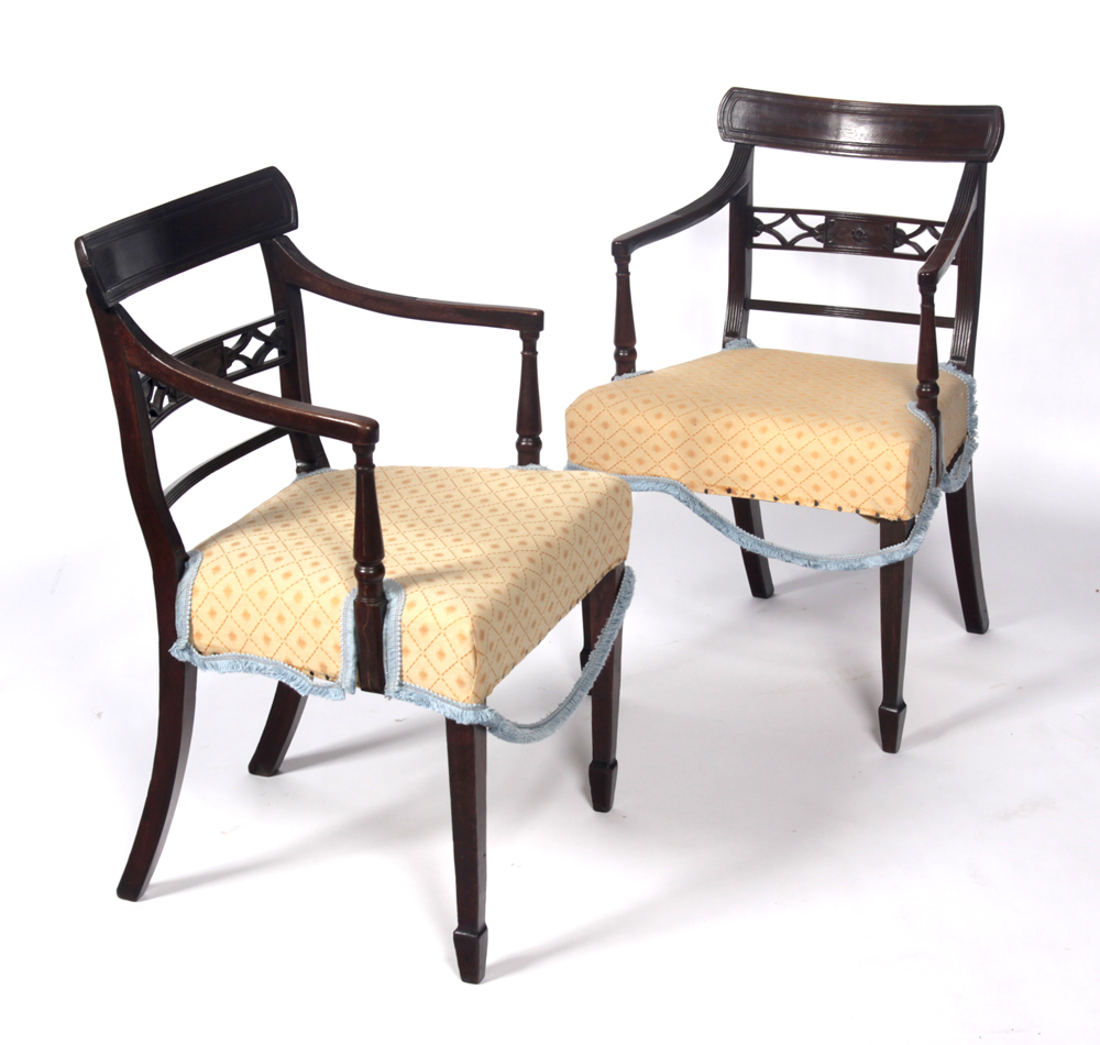 A pair of Regency mahogany carvers