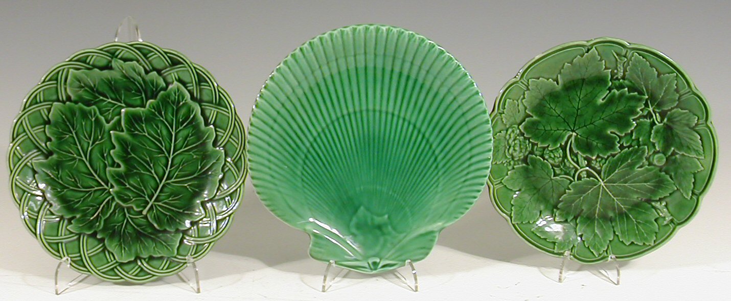 A composite collection of green glazed fruit plates,