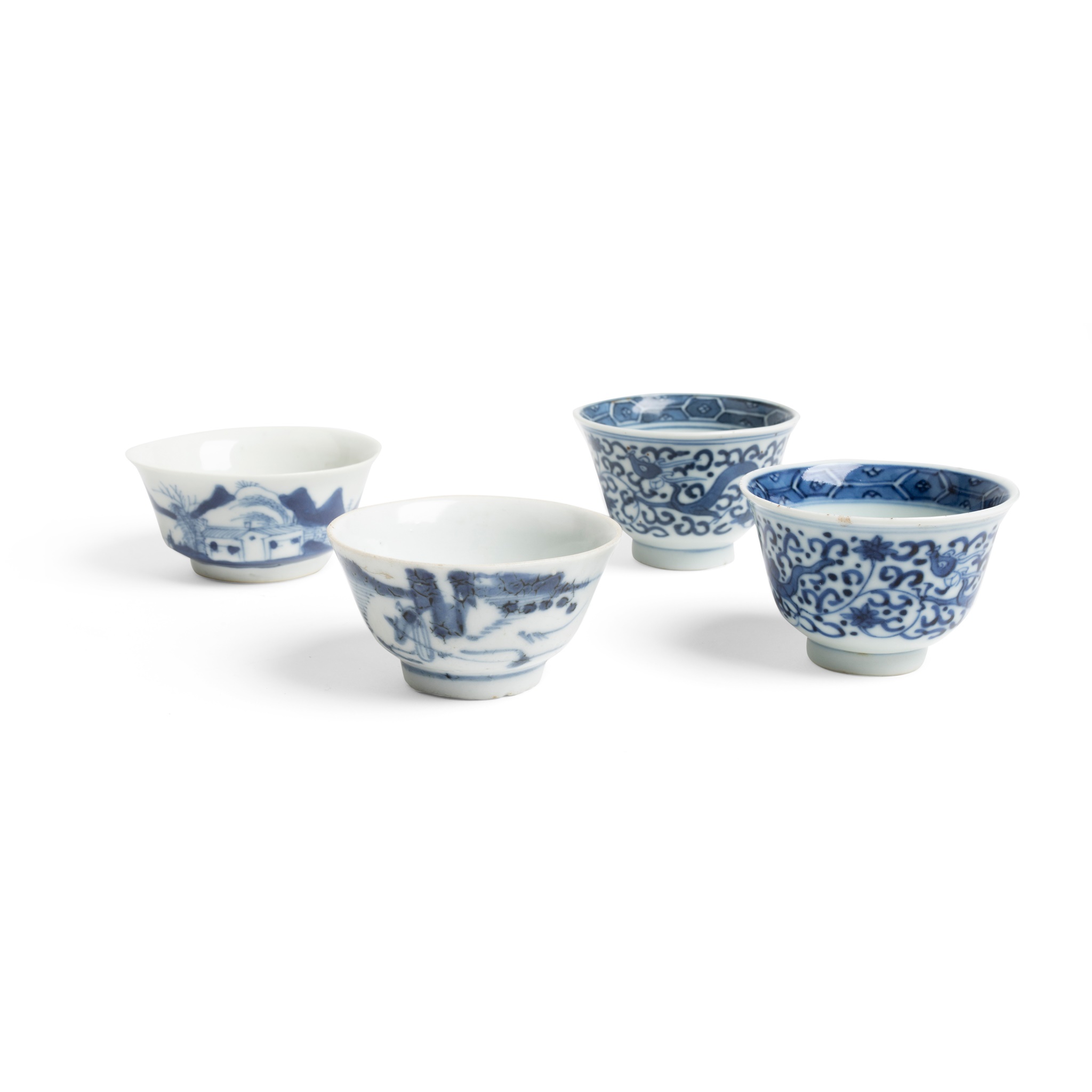 GROUP OF FOUR BLUE AND WHITE CUPS