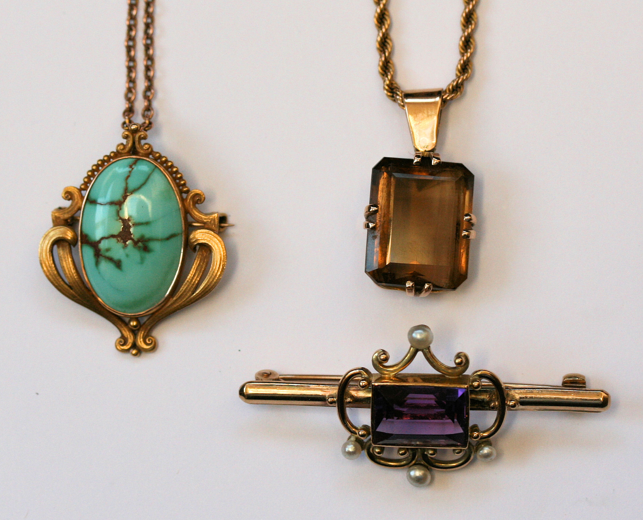 An Amethyst and pearl set bar brooch