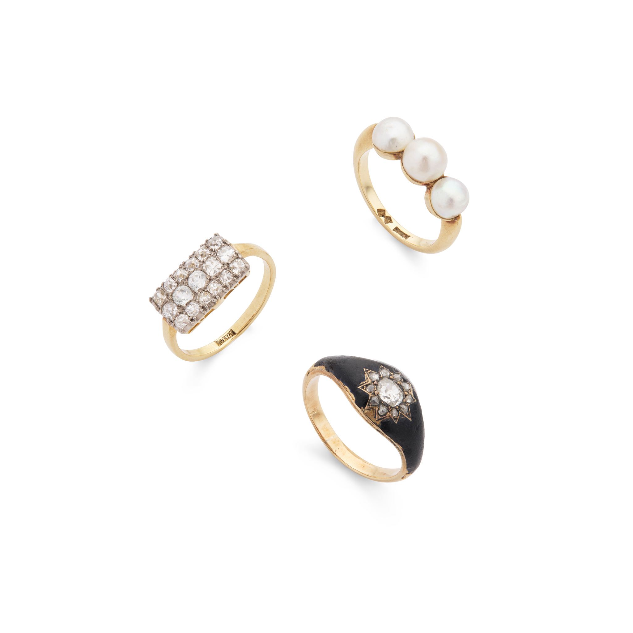 Three diamond and/or pearl rings
